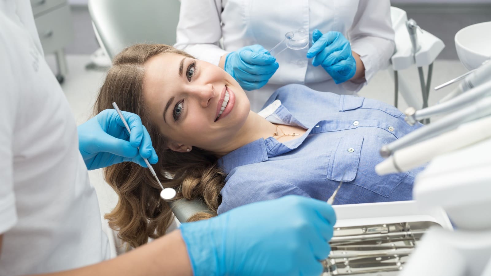 Woman smiling while in dental chair