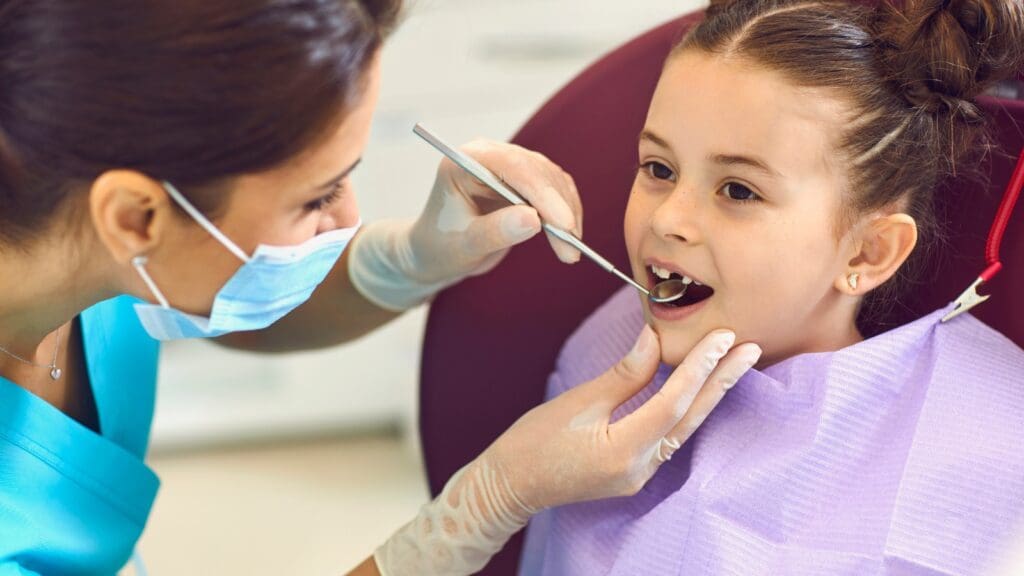 Child receiving dental care