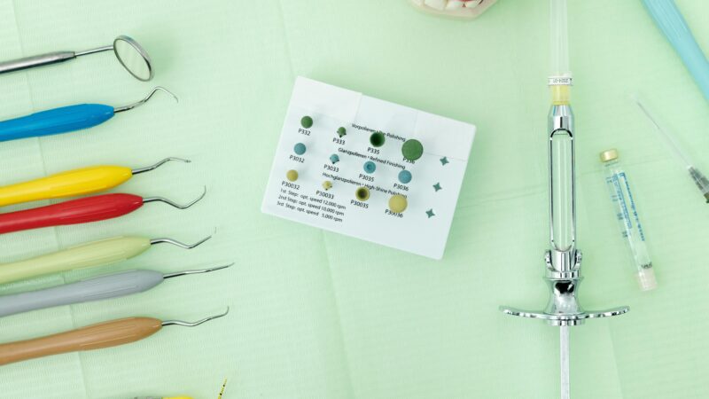 Dentist performing dental procedure on patient