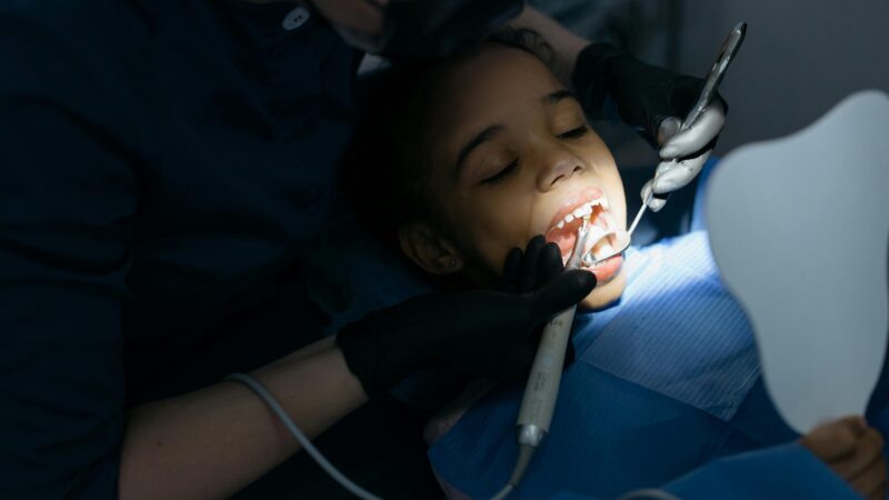Dentist explaining dental coverage options to patient