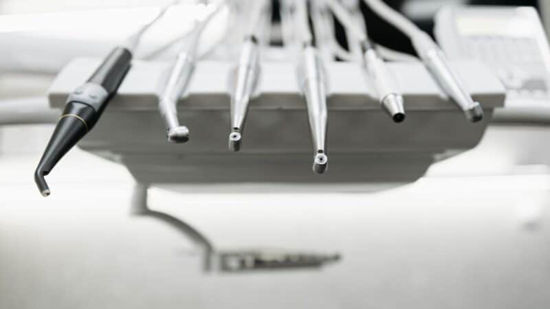 Dental professional working on dental crown restoration