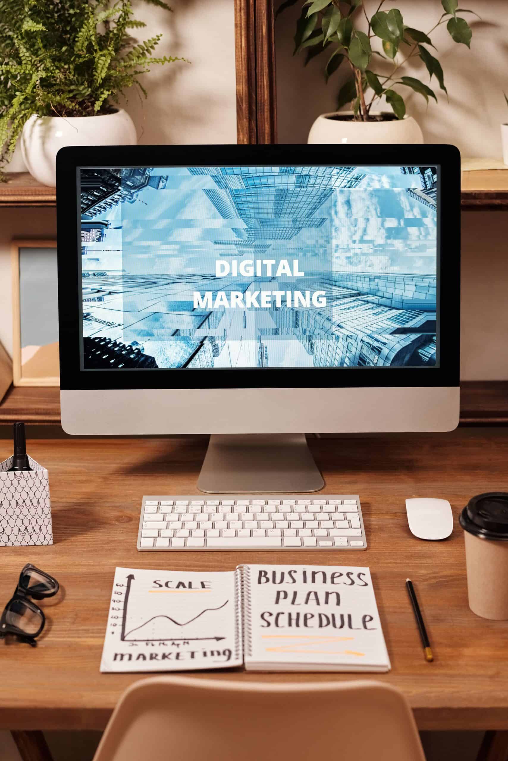 Dental practice owner writing blog content on laptop for content marketing